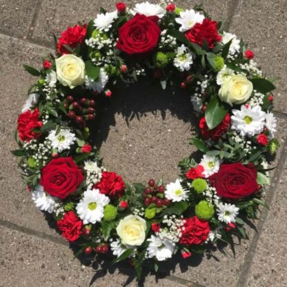 Elegant Funeral Flower Arrangement with White Chrysanthemums, Pink Stock , Pink Roses, and White Lilies