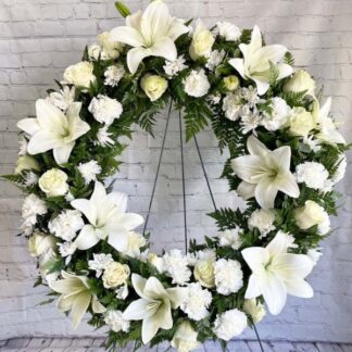 Funeral Bouquet with White Lilies, White Roses, Eucalyptus, and Greenery
