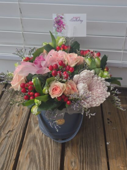 Elegant Flower Arrangement in a Gray Box with Roses, Chrysanthemums, Alstroemeria, Hypericum, and Orchids