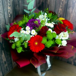 Bright Bouquet with Chrysanthemums, Red Gerberas, Alstroemeria, Eucalyptus, and Red Roses – A Bold Gift with Character