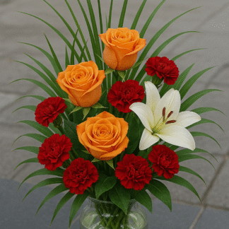Bouquet in a Clear Glass Vase with Yellow Roses, Red Carnations, White Lily, and Greenery