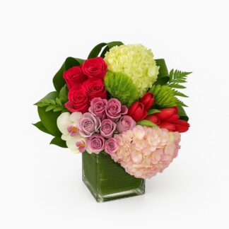 Luxurious Bouquet in a Glass Vase with Hydrangeas, Tulips, Roses, and Orchids